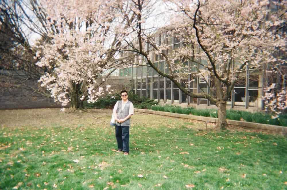 Andie under cherry blossoms